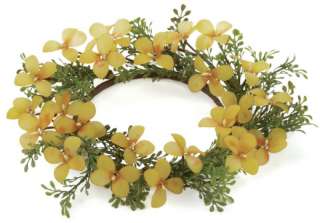 This set of 8 actylic yellow dogwood pillar candle rings make a 