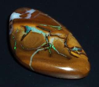 This is a boulder opal cabochon, We make these ourselves and spend a 