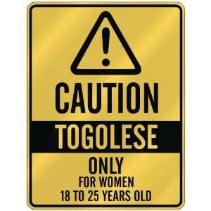 CAUTION  TOGOLESE ONLY FOR WOMEN 18 TO 25 YEARS OLD  PARKING SIGN 