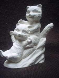C411   4 1/2  2 Ceramic Bisque Playful Raccoons on Rock Figurine 