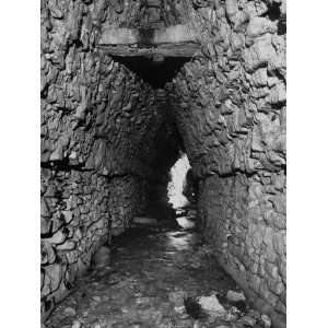  A Stream Running Through a Man Made Stone Tunnel Premium 