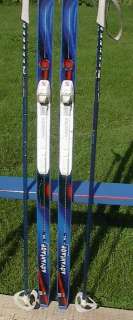 The skis are signed PELTONEN. Measures 78 (200 cm) long. Have SNS 