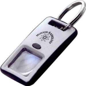   The Traveler Collection   Magnifying glass key ring.