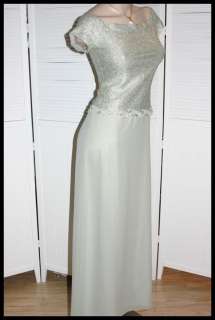 Details Beautiful long formal gown, top has metallic fiber added and 