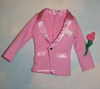 This is a pink tuxedo suit jacket with flowers for ken doll, is brand 