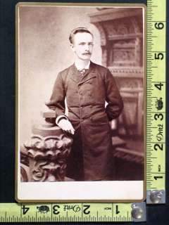 This is a wonderful antique cabinet photo card of a standing young man 