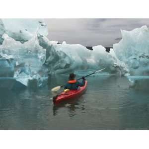 Kayak Paddler Passes Sculpted Icebergs in Tracy Arm Fjord National 