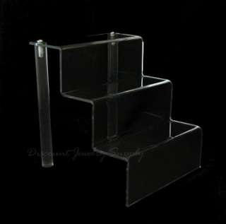   clear acrylic stairway stand 2 deep shelves and unit is 6 wide x 6 3 4
