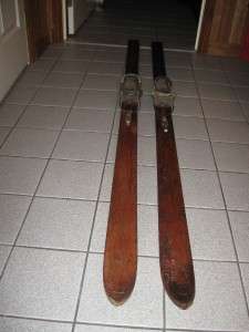 ANTIQUE WOODEN WILSON SKIS WITH RIDGE TOPS AND BEAR TRAP BINDINGS 