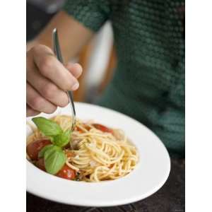 Woman Eating Spaghetti with Tomatoes, Parmesan and Basil Photographic 